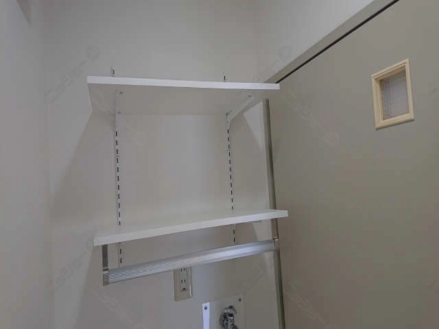 洗濯機上部可動棚