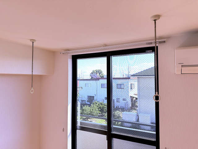 室内物干し竿かけ