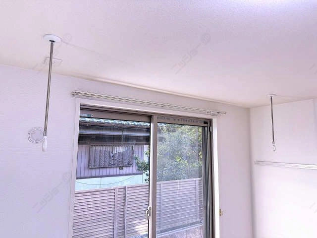 室内物干し竿かけ