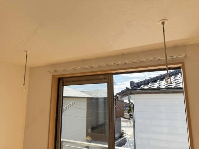 室内物干し竿かけ