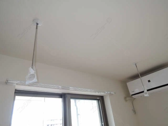 室内物干し竿かけ