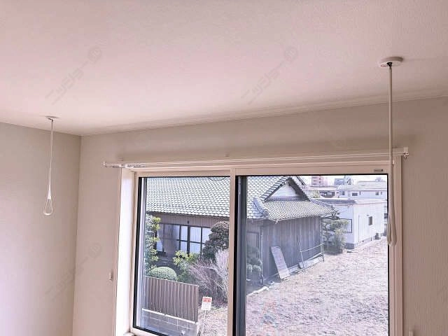 室内物干し竿かけ