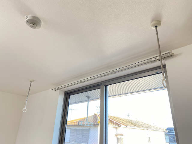 室内物干し竿かけ