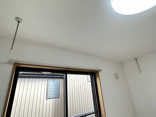 室内物干し竿かけ