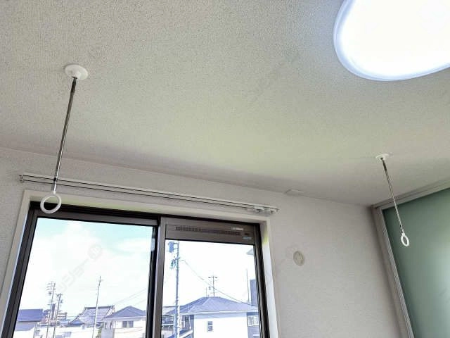 室内物干し竿かけ